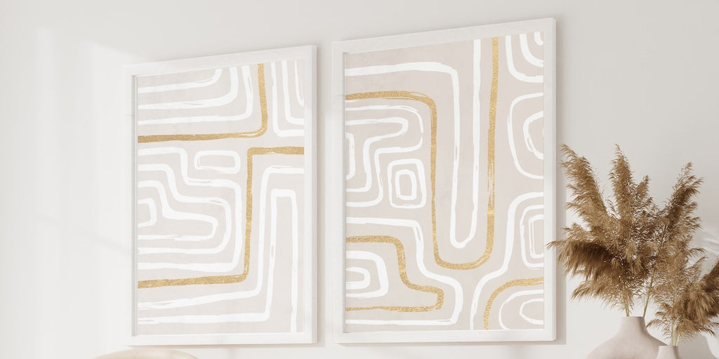 Set of 2 wall art framed prints. Gold and white abstract.