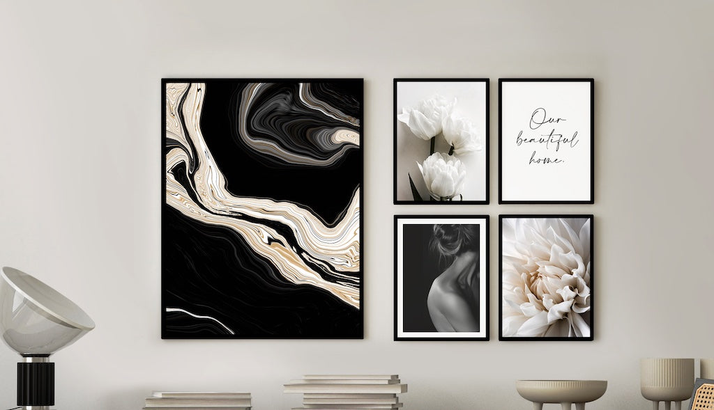 black and white gallery wall including floral nature wall art